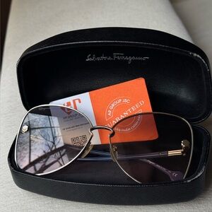 Salvatore Ferragamo women’s sunglasses pre-owned with box and guaranteed card